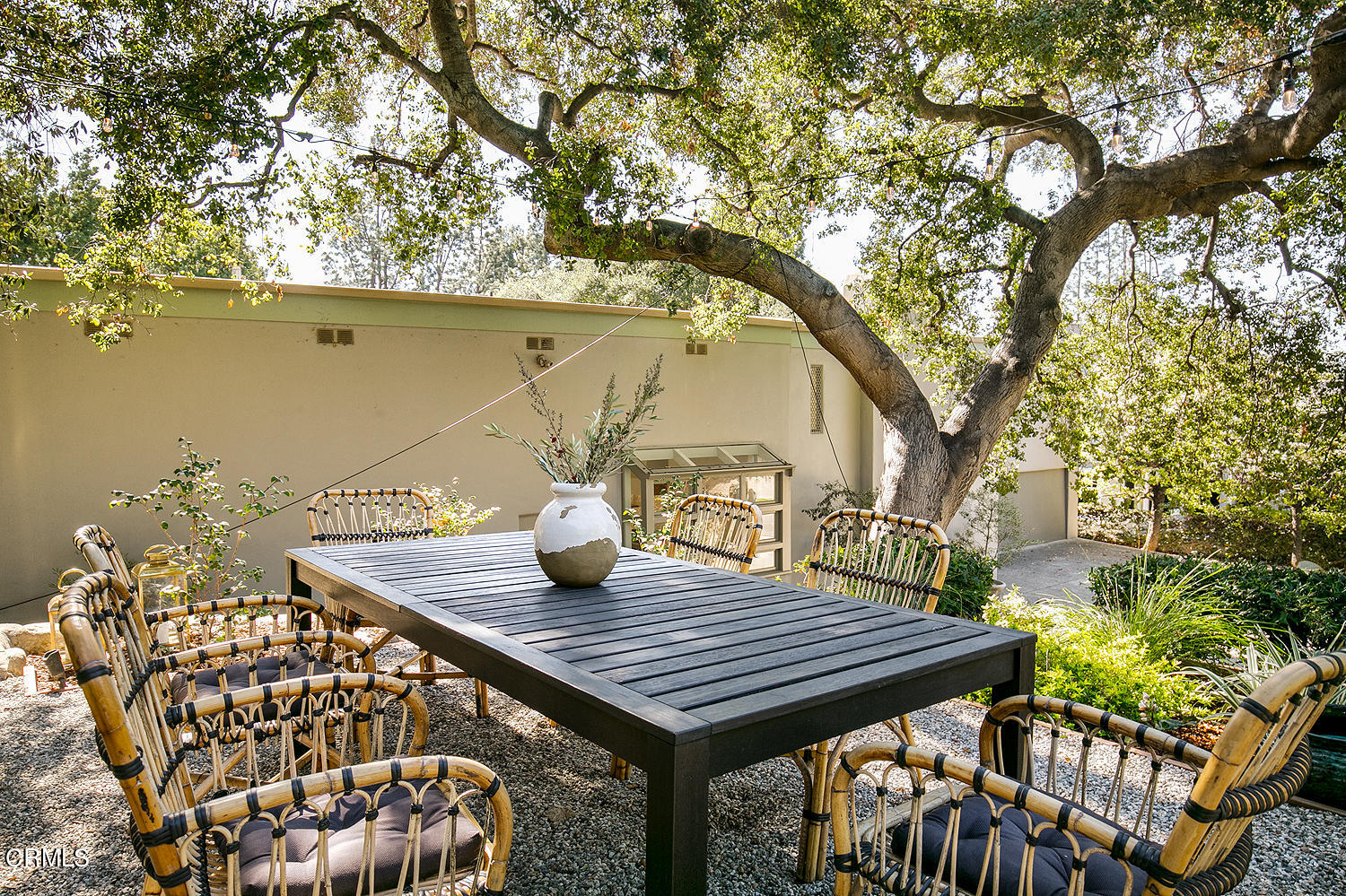 490 La Loma Road Pasadena, CA 91105 - Photo 7 of 59 a view of a roof deck with table and chairs and wooden floor