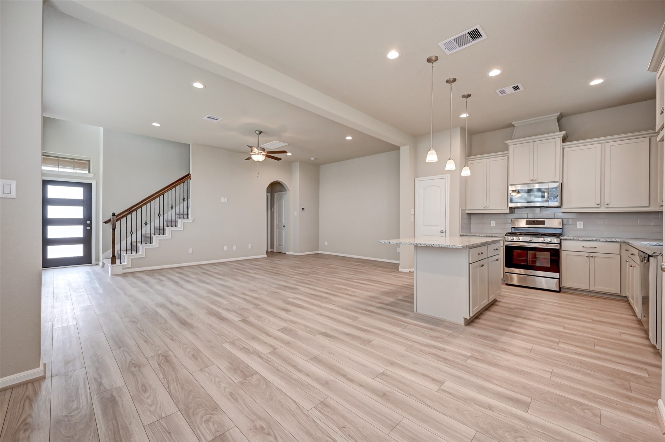 5039 Prairie Terrace Lane Fulshear, TX 77441 - Photo 4 of 16 View of the family room & kitchen from the Breakfast area.