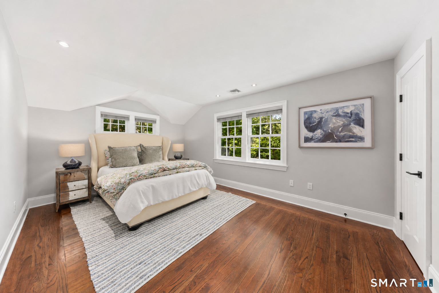 99 Hickok Road New Canaan, CT 06840 - Photo 23 of 39 a bedroom with a large bed and a window