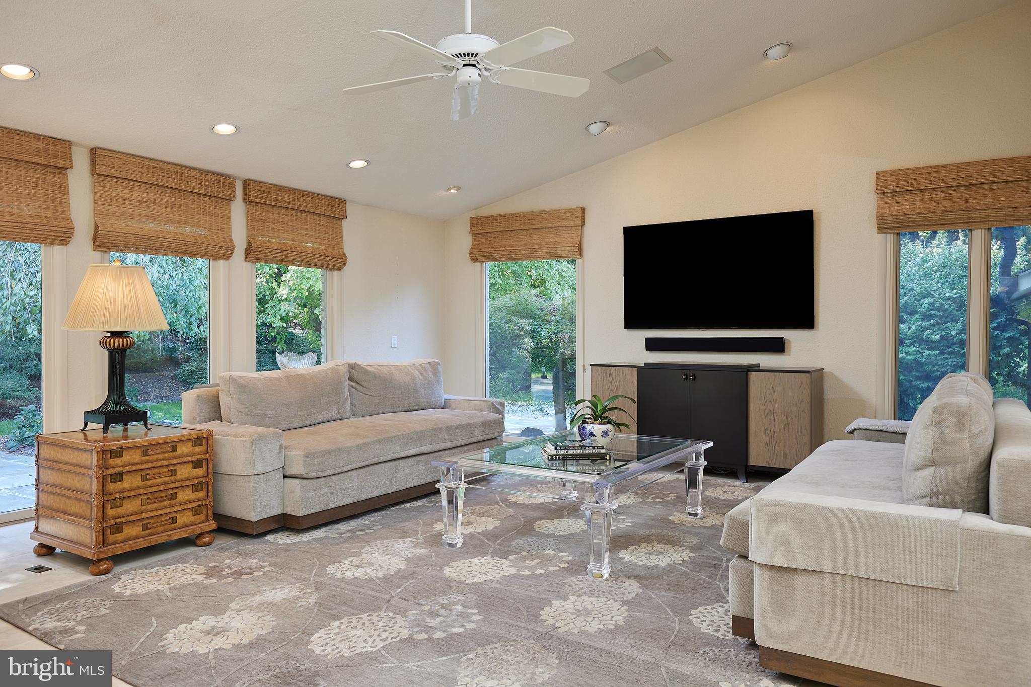 10811 Barn Wood Lane Potomac, MD 20854 - Photo 11 of 41 Wall of Windows with an Abundance of Natural Light