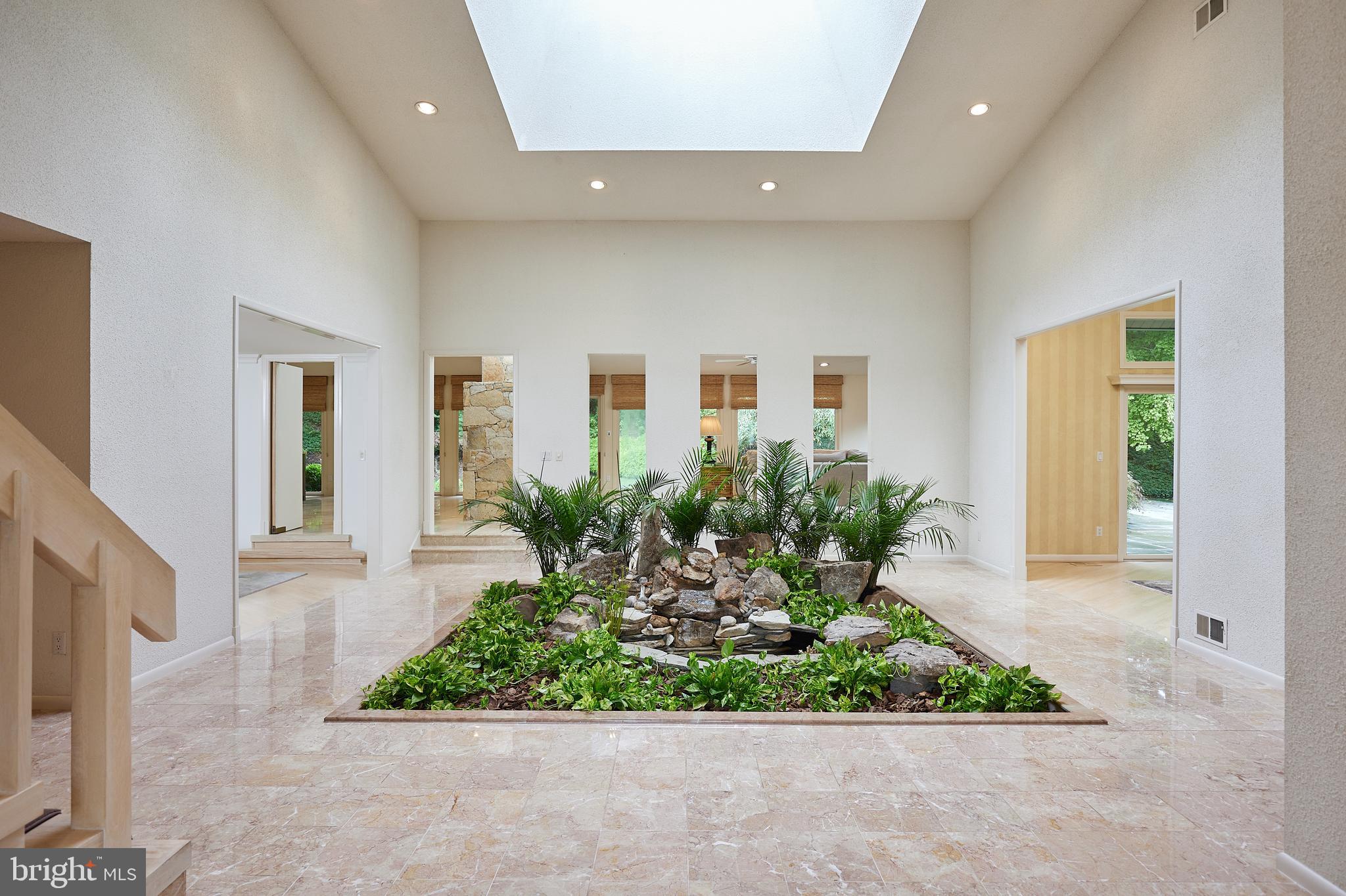 10811 Barn Wood Lane Potomac, MD 20854 - Photo 3 of 41 Two Story Grand Foyer with Skylight