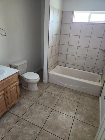 a view of a swimming pool with an outdoor seating