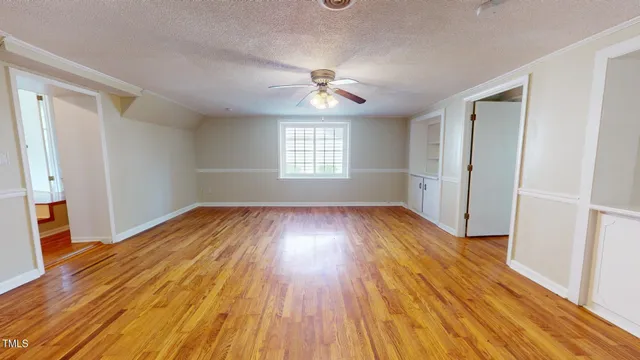 a kitchen with stainless steel appliances granite countertop a refrigerator and cabinets