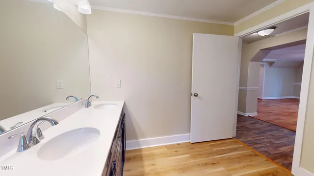 a kitchen with granite countertop cabinets stainless steel appliances a sink and a window