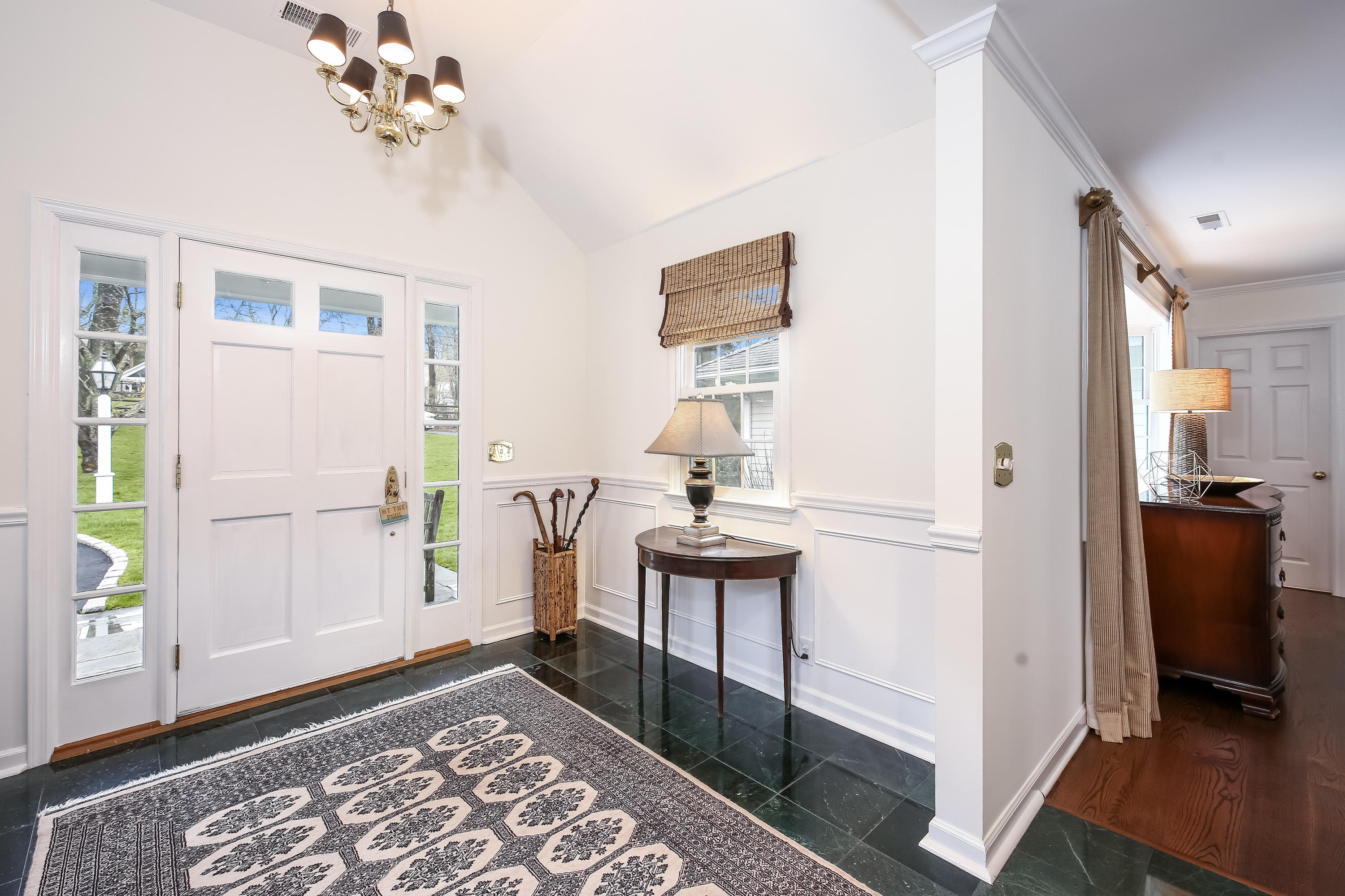 2 4 Acres Road Darien, CT 06820 - Photo 5 of 26 a view of a hallway with bathroom and wooden floor