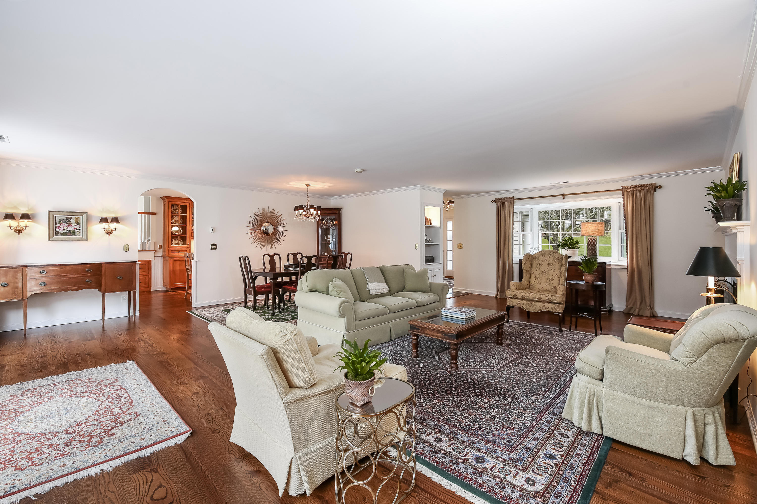 2 4 Acres Road Darien, CT 06820 - Photo 7 of 26 a living room with furniture and a table
