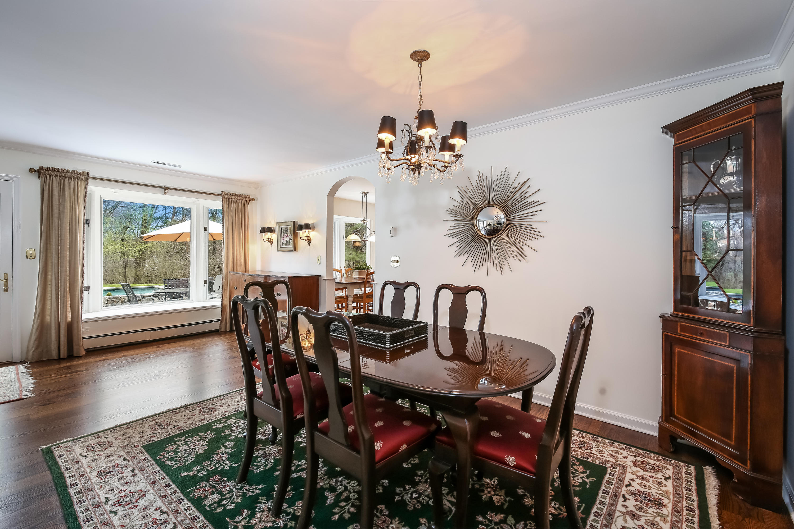 2 4 Acres Road Darien, CT 06820 - Photo 8 of 26 a view of a dining room with furniture and wooden floor