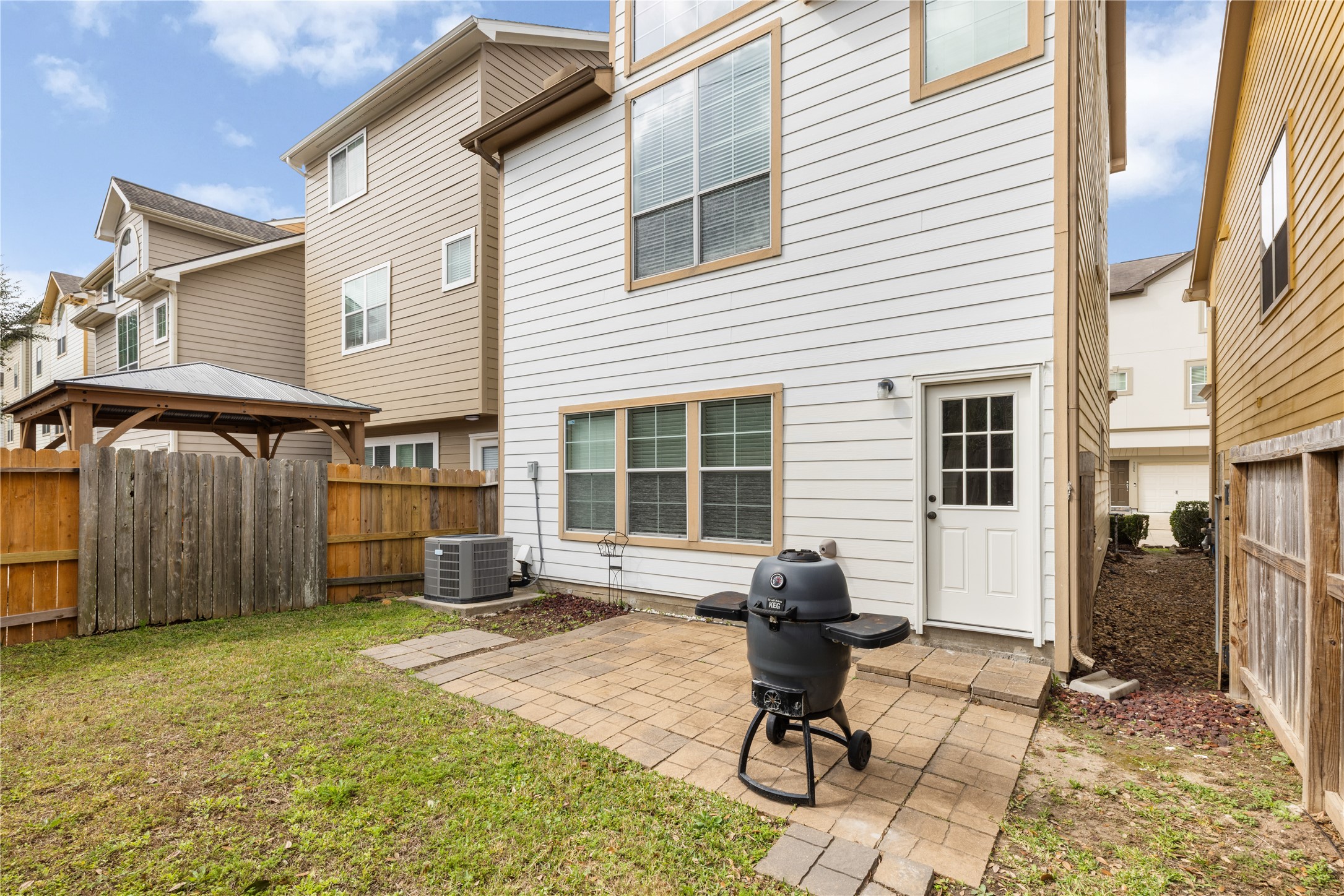 3334 Clearview Villa Way Houston, TX 77025 - Photo 28 of 35 Enjoy grilling on the back yard pavers.