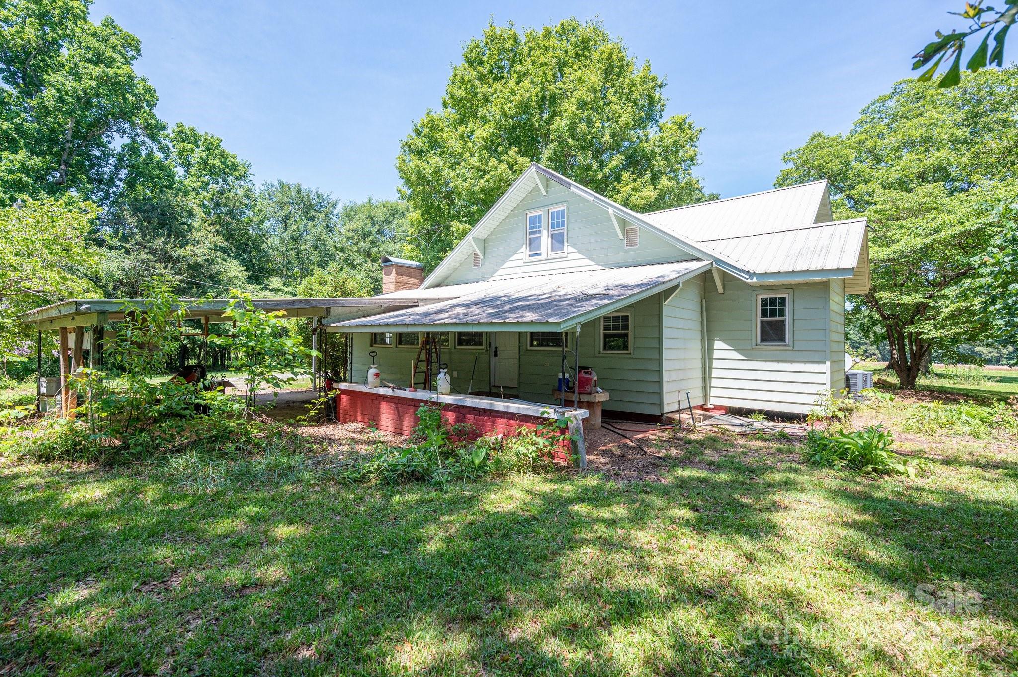 1173 Cat Square Road Vale, NC 28168 - Photo 2 of 33 a view of a house with a yard patio and deck