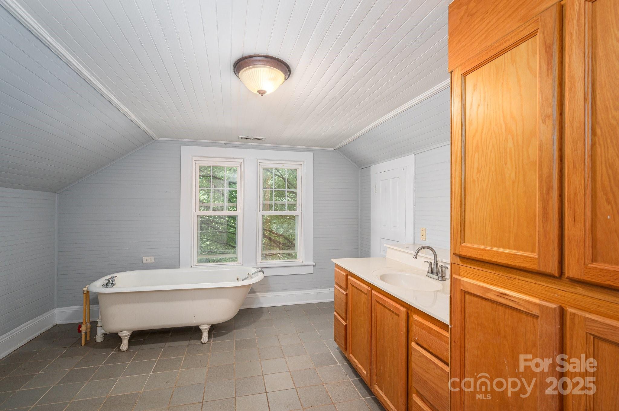 1173 Cat Square Road Vale, NC 28168 - Photo 21 of 33 a spacious bathroom with a tub sink and mirror