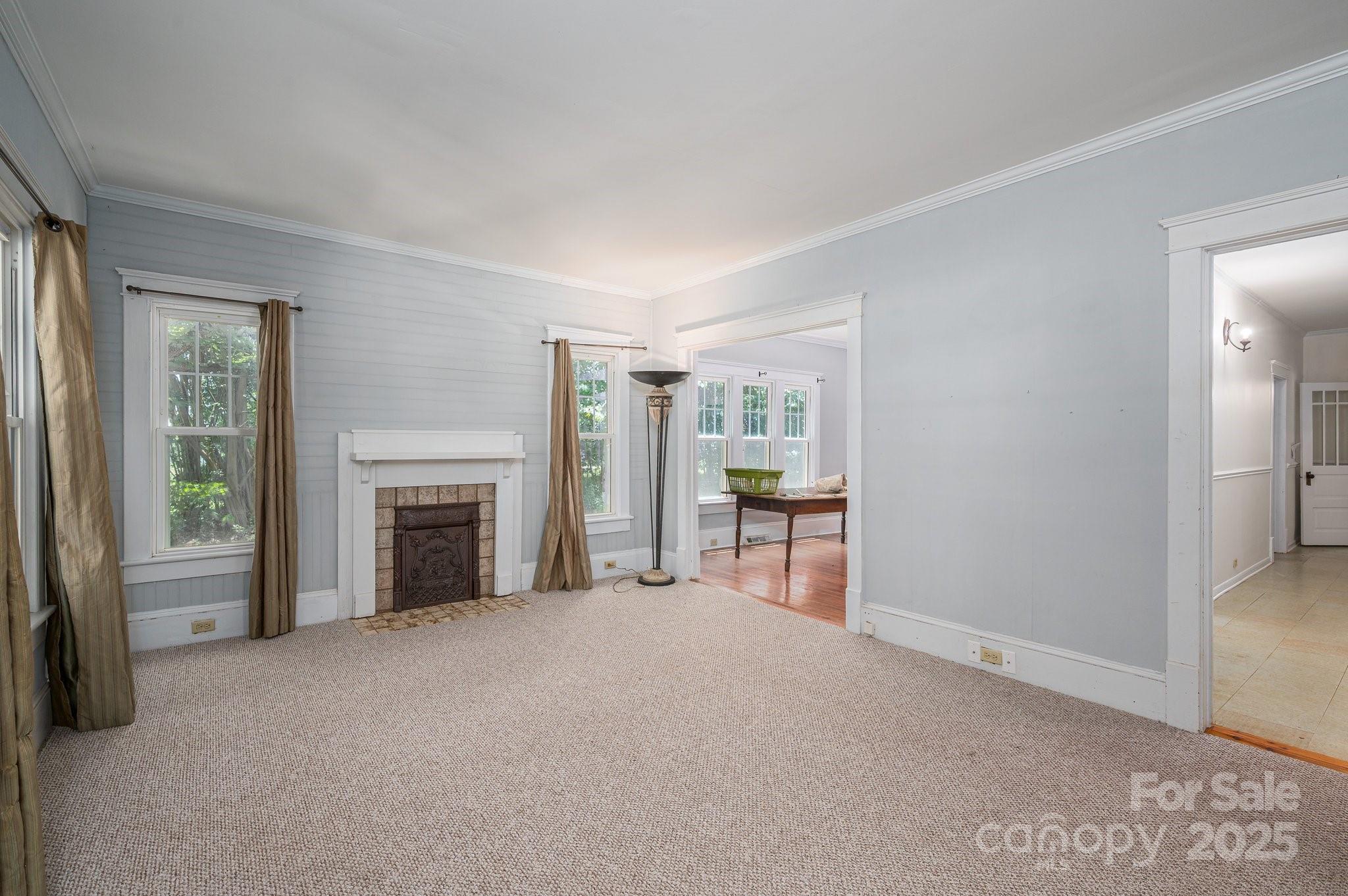 1173 Cat Square Road Vale, NC 28168 - Photo 5 of 33 a view of a livingroom with an empty space and a fireplace