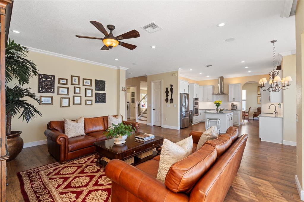 19239 Southwest 54th Street Miramar, FL 33029 - Photo 13 of 82 a living room with furniture kitchen view and a wooden floor