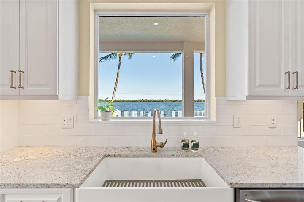 19239 Southwest 54th Street Miramar, FL 33029 - Photo 20 of 82 a bathroom with a granite countertop sink and a mirror