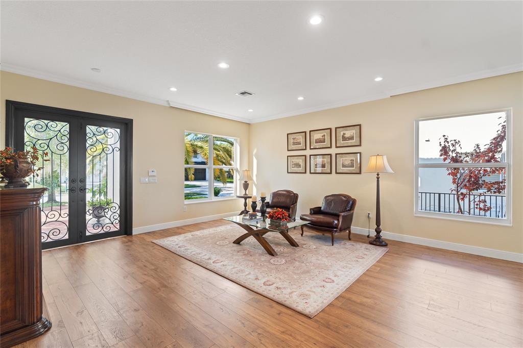 19239 Southwest 54th Street Miramar, FL 33029 - Photo 27 of 82 a living room with furniture window and wooden floor
