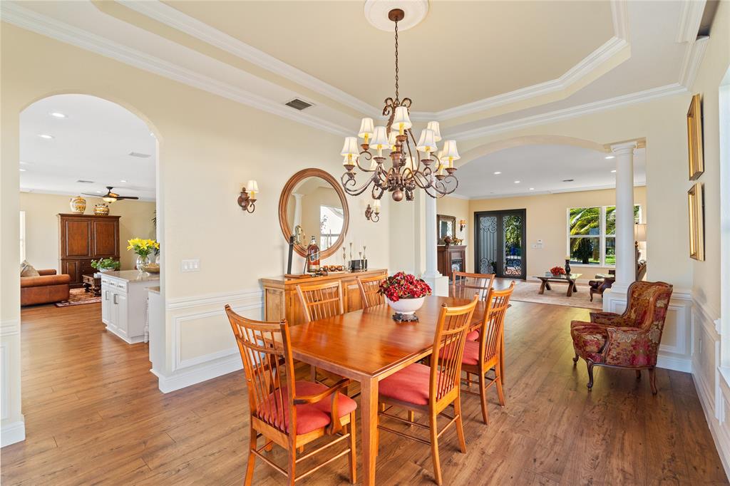 19239 Southwest 54th Street Miramar, FL 33029 - Photo 30 of 82 a view of a dining room with furniture and wooden floor