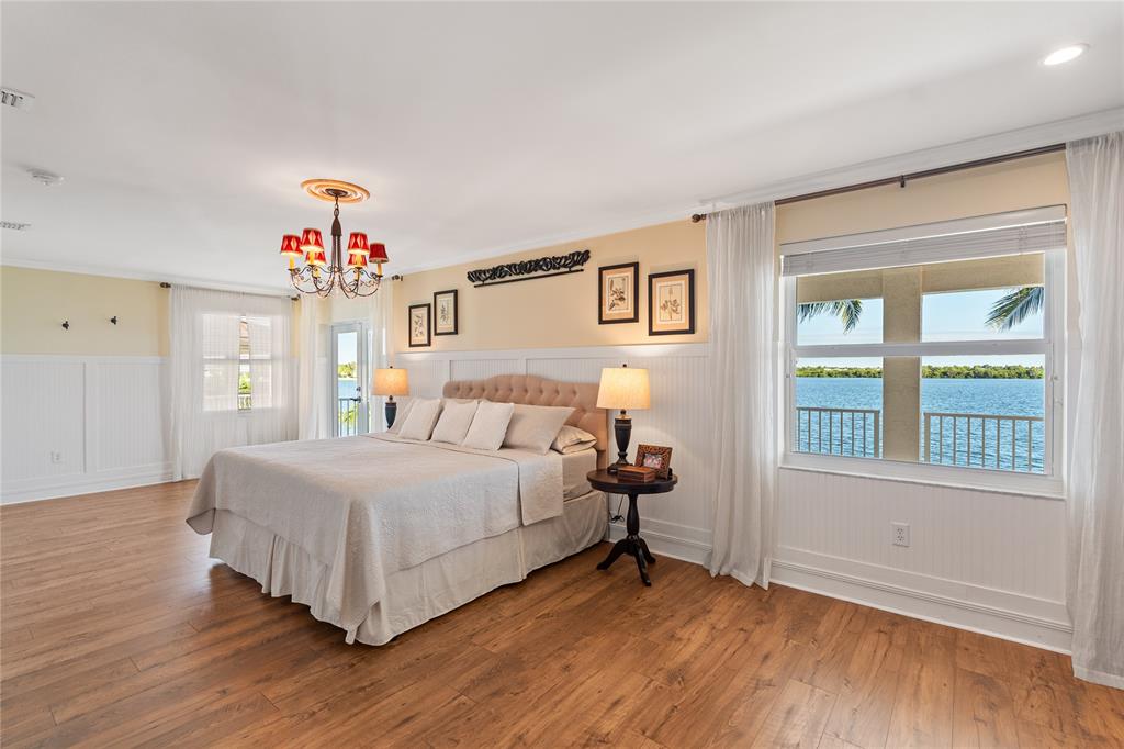 19239 Southwest 54th Street Miramar, FL 33029 - Photo 55 of 82 a bedroom with a bed and a window