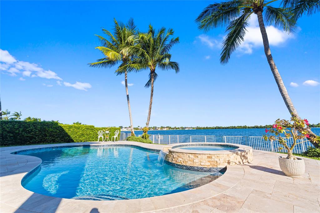 19239 Southwest 54th Street Miramar, FL 33029 - Photo 68 of 82 a view of a swimming pool with a lounge chair