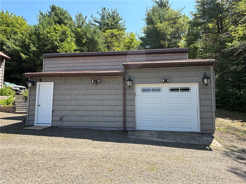 179 Sparrowhawk Lake Road Maryland, NY 12155 - Photo 37 of 49 Garage by house