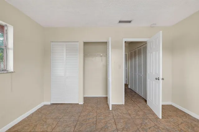 an empty room with closet