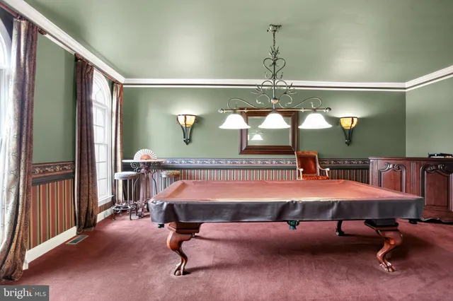 a room with table and chairs