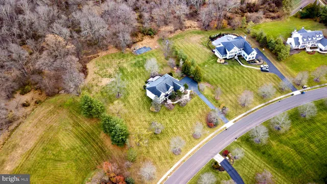 a view of a town with mountains in the background