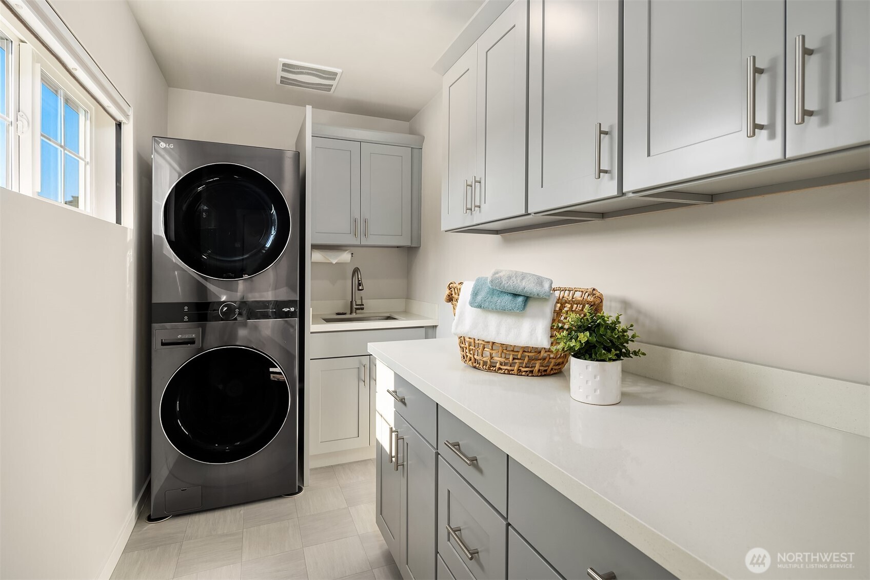 16911 125th Street Southeast Snohomish, WA 98290 - Photo 12 of 29 a kitchen with a sink a stove and cabinets