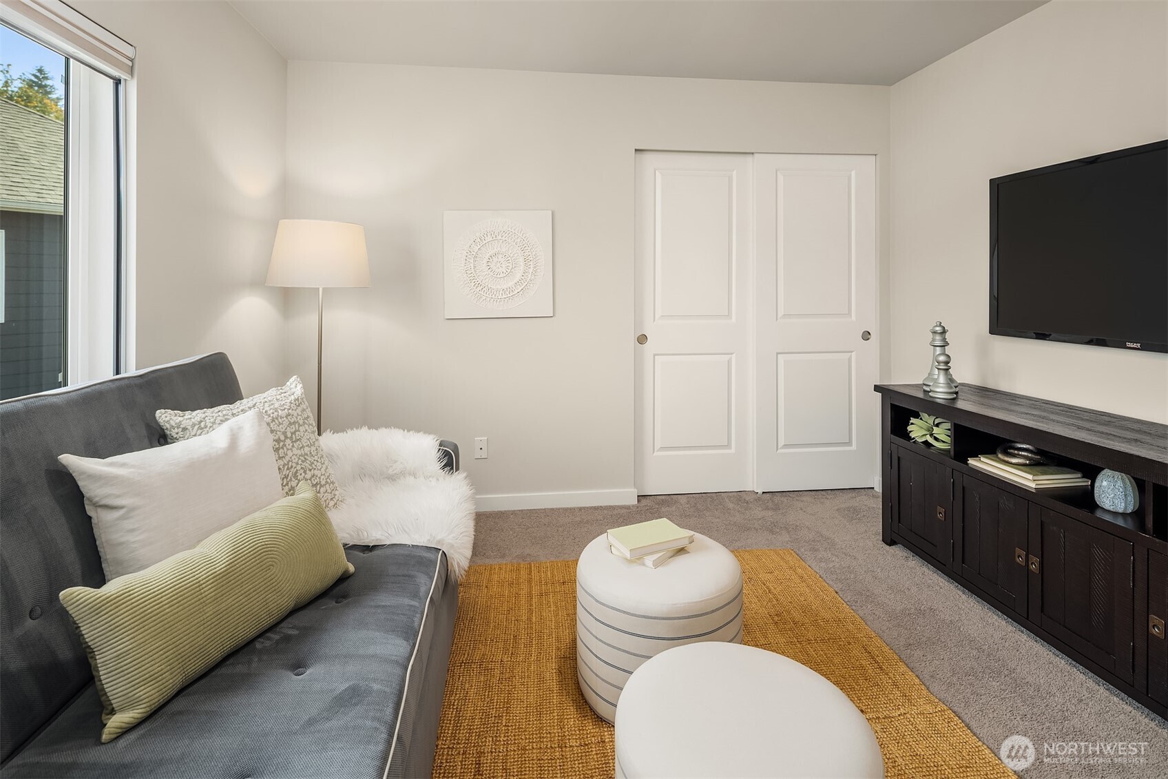 16911 125th Street Southeast Snohomish, WA 98290 - Photo 17 of 29 a living room with furniture and a flat screen tv
