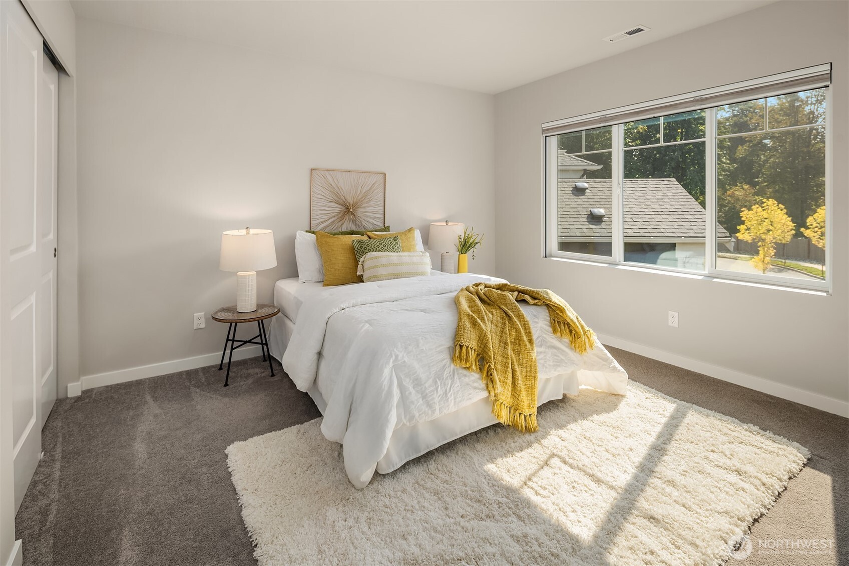 16911 125th Street Southeast Snohomish, WA 98290 - Photo 20 of 29 a bedroom with a bed and a large window