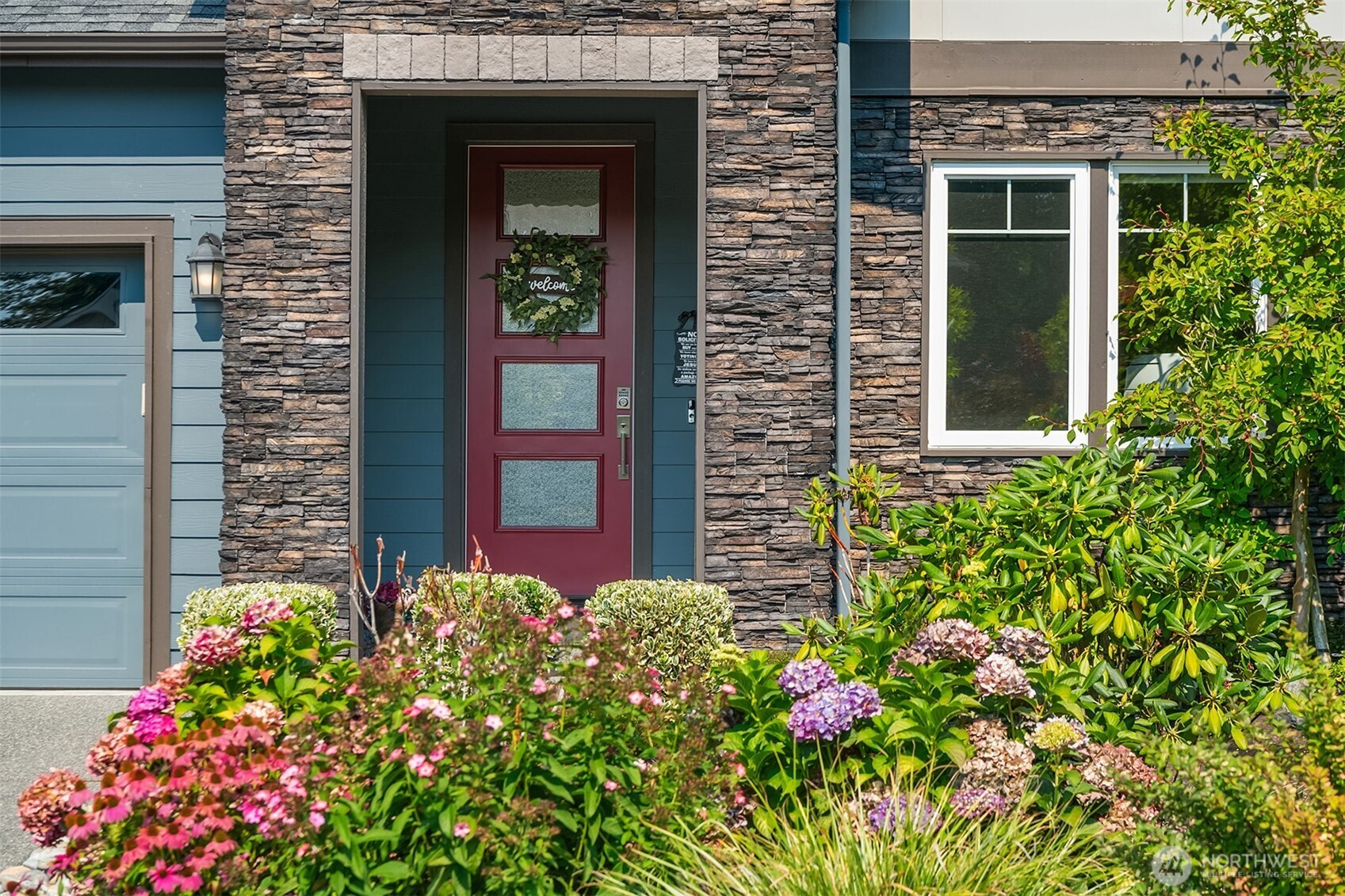 16911 125th Street Southeast Snohomish, WA 98290 - Photo 2 of 29 a view of a house with potted plants