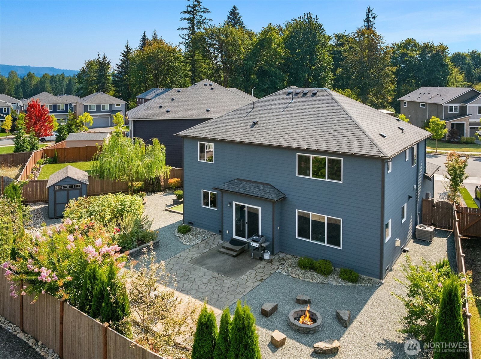 16911 125th Street Southeast Snohomish, WA 98290 - Photo 25 of 29 a front view of a house with garden