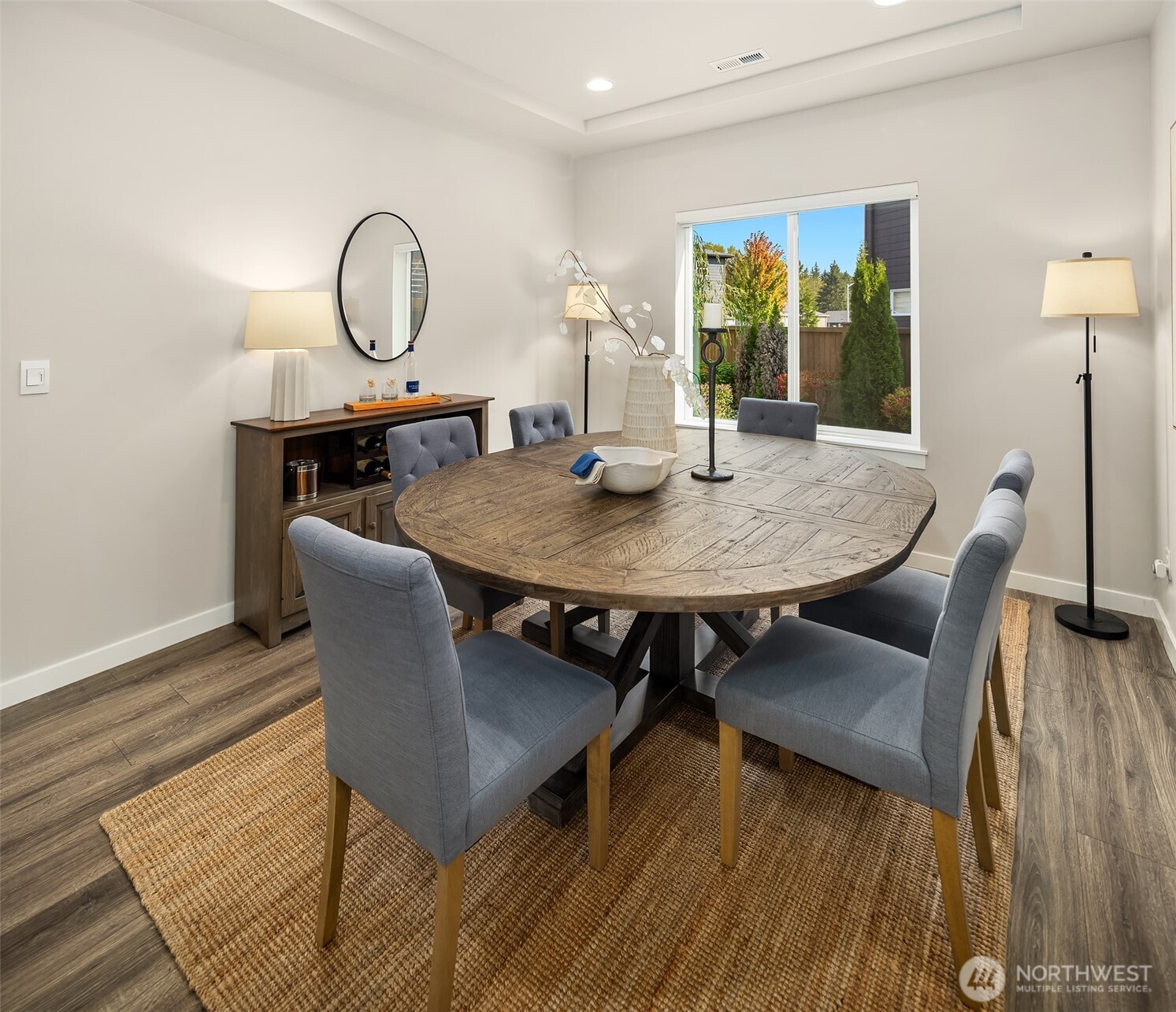 16911 125th Street Southeast Snohomish, WA 98290 - Photo 4 of 29 a view of a dining room with furniture and wooden floor