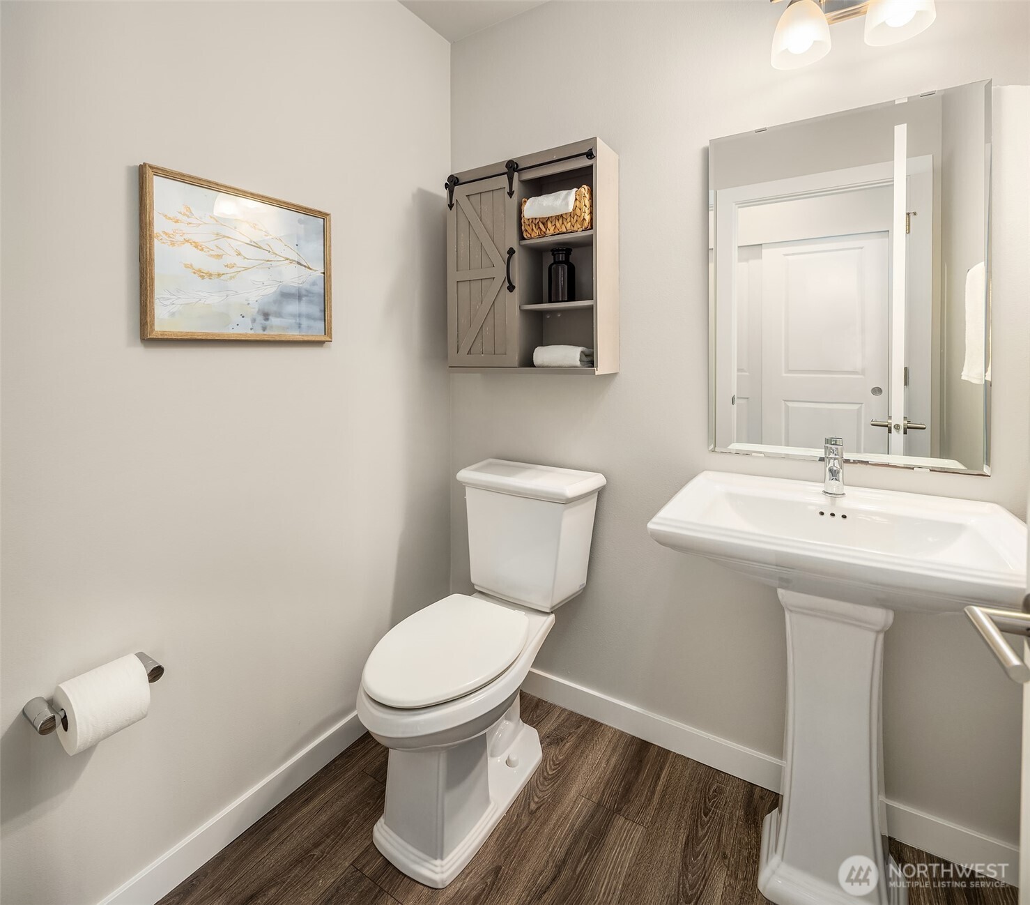 16911 125th Street Southeast Snohomish, WA 98290 - Photo 10 of 29 a bathroom with a toilet sink and mirror