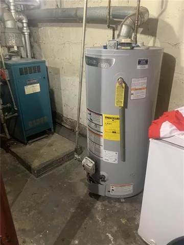 a view of a patio with table and chairs potted plants with wooden fence