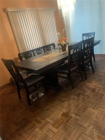 a view of a workspace with furniture