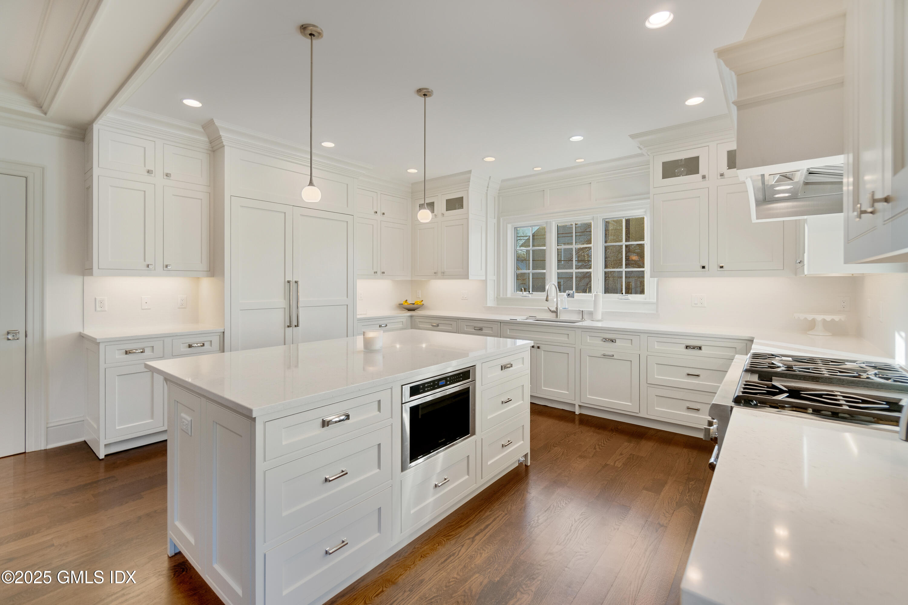 3 Orchard Place, Unit A Greenwich, CT 06830 - Photo 6 of 19 a kitchen with a stove a sink and a refrigerator