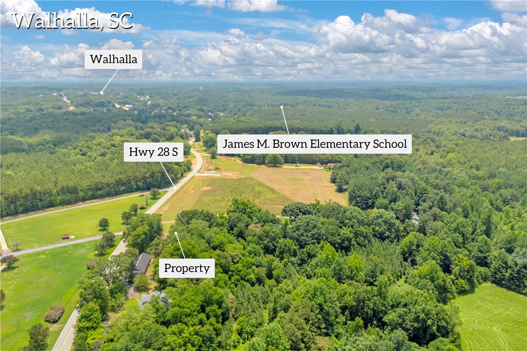 100 Newberry Road Walhalla, SC 29691 - Photo 5 of 13 An aerial perspective reveals a prime property site amidst verdant landscapes and convenient roadway access.
