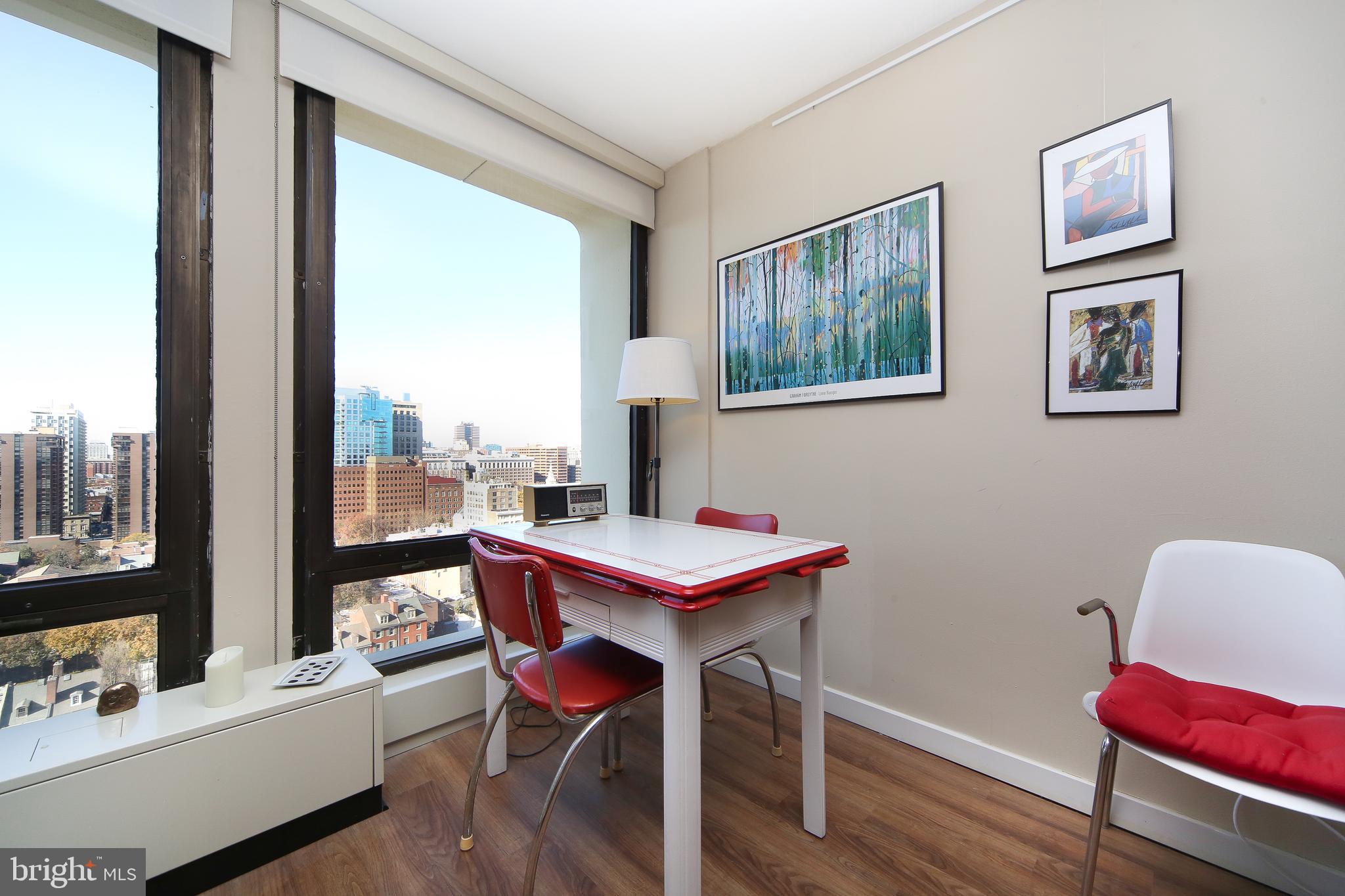 210 Locust Street, Unit 21E Philadelphia, PA 19106 - Photo 12 of 51 a room with furniture and a window