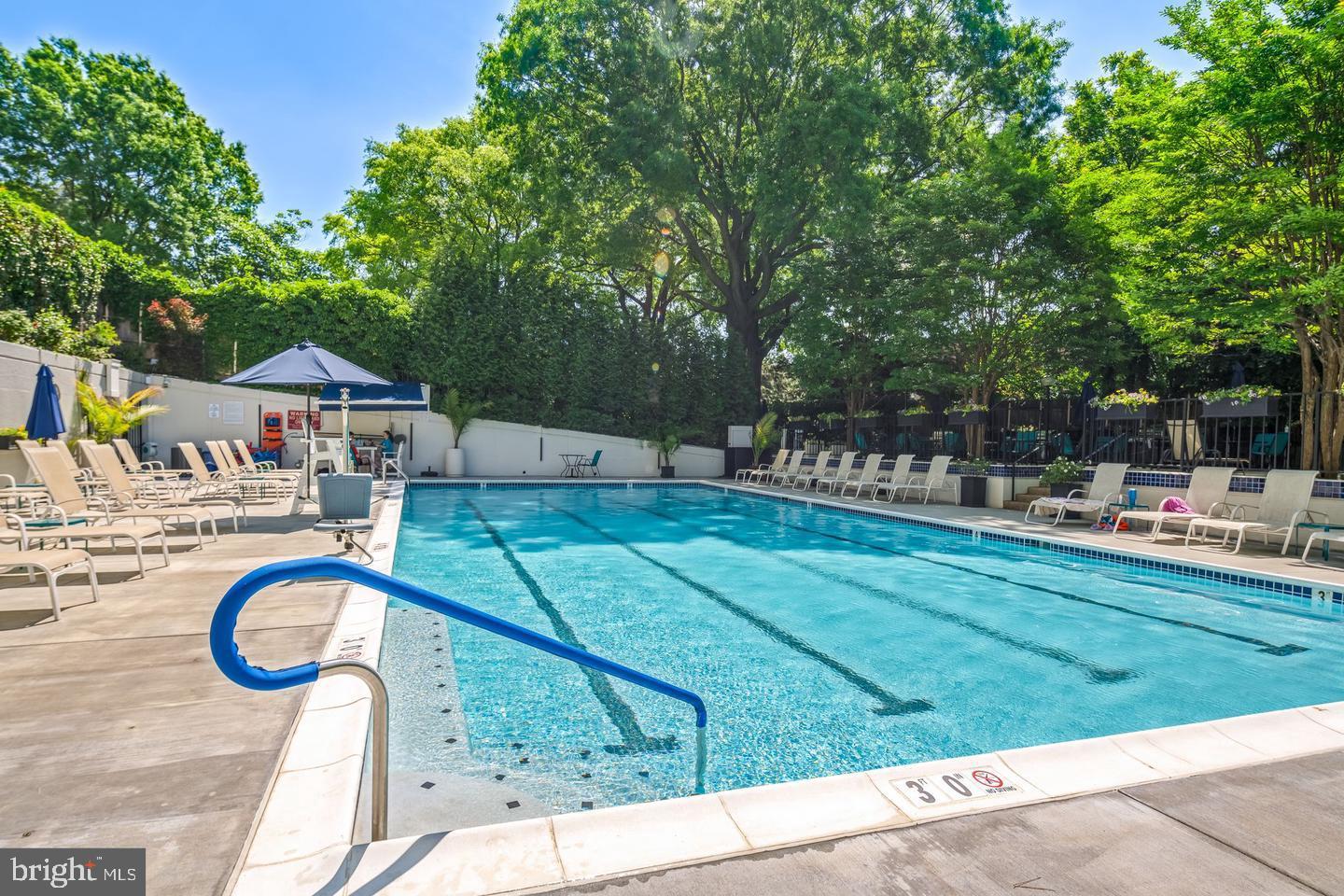210 Locust Street, Unit 21E Philadelphia, PA 19106 - Photo 26 of 51 a swimming pool with outdoor seating and yard