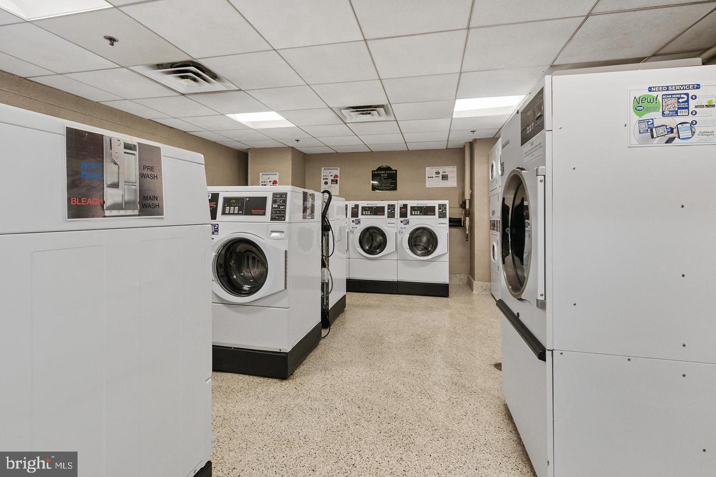 210 Locust Street, Unit 21E Philadelphia, PA 19106 - Photo 41 of 51 a utility room with dryer and washer