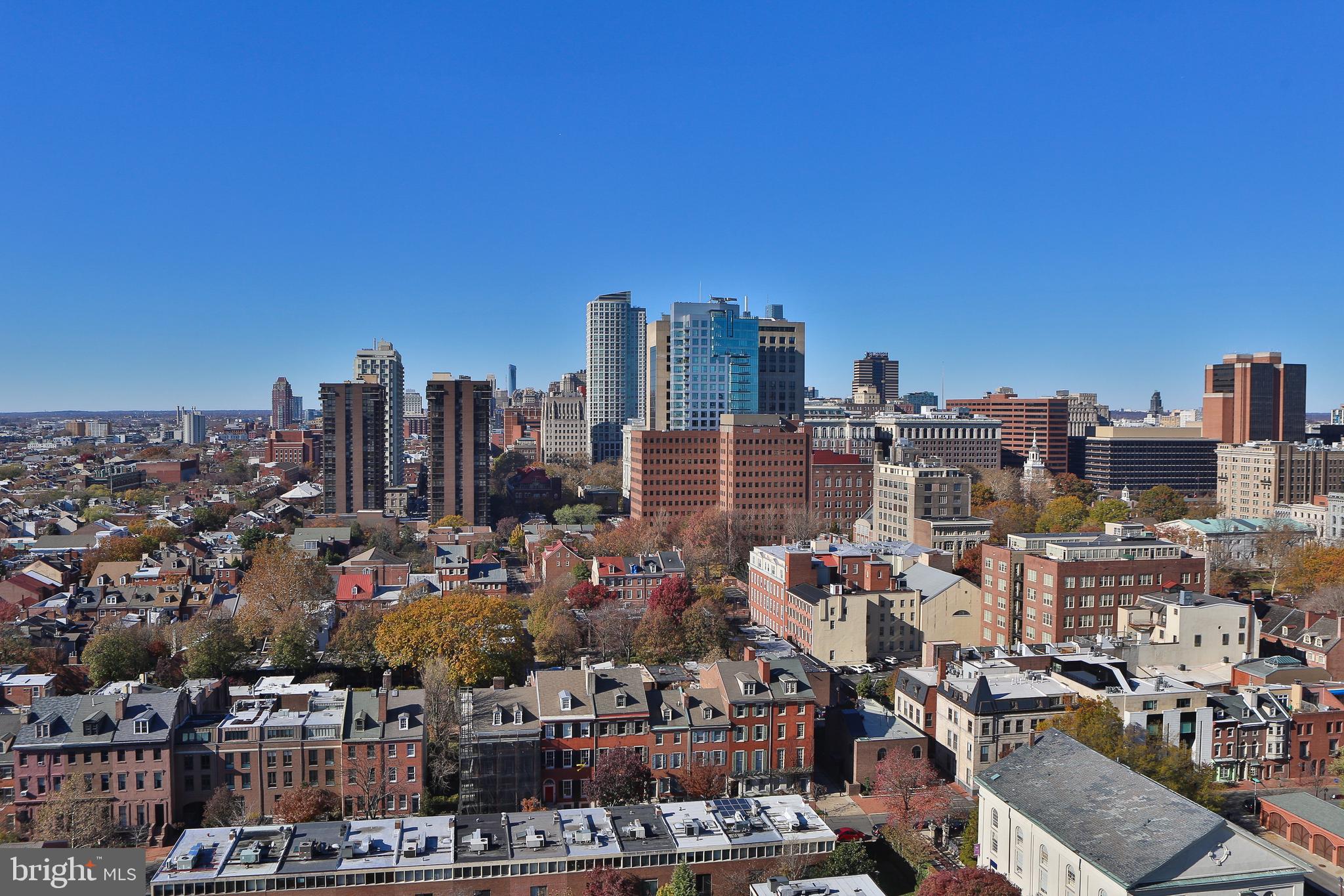 210 Locust Street, Unit 21E Philadelphia, PA 19106 - Photo 9 of 51 a view of a city with tall buildings