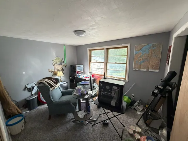 a backyard of a house with lots of green space