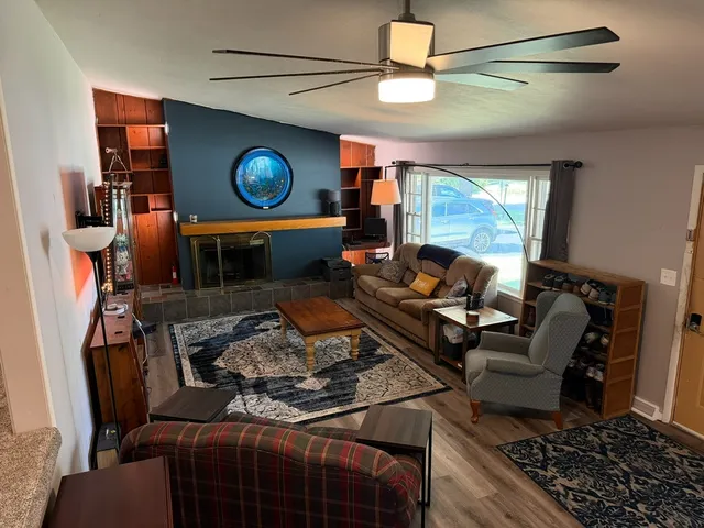 a bedroom with a bed and dresser