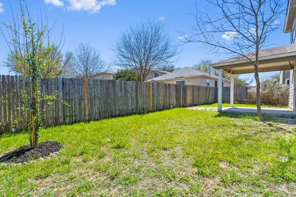 a view of a backyard with a garden