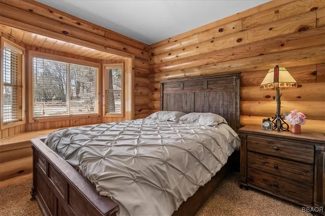 a view of a balcony with furniture