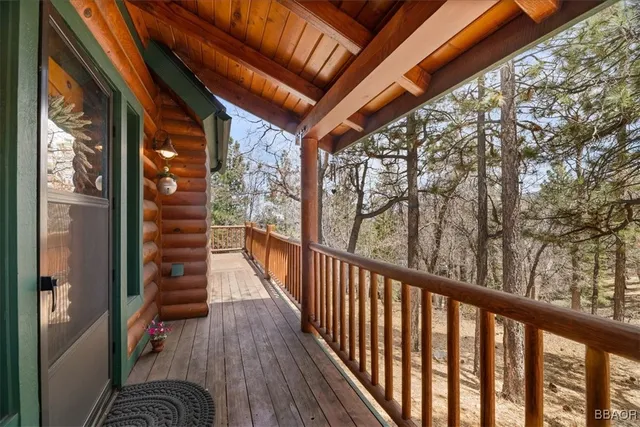 a view of balcony with wooden floor