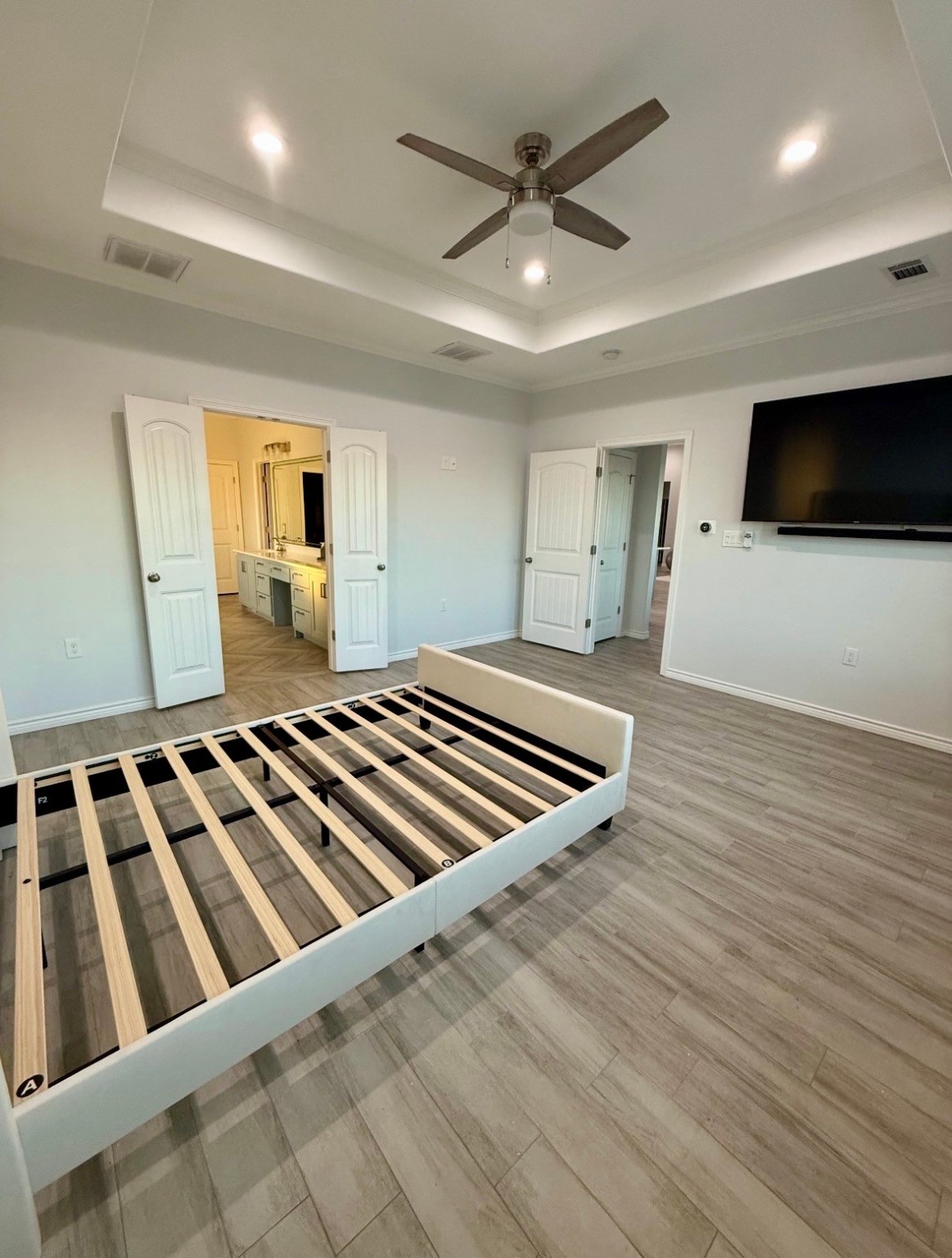 2295 Diamond D Lane Beaumont, TX 77713 - Photo 14 of 28 a view of an empty room with wooden floor and windows