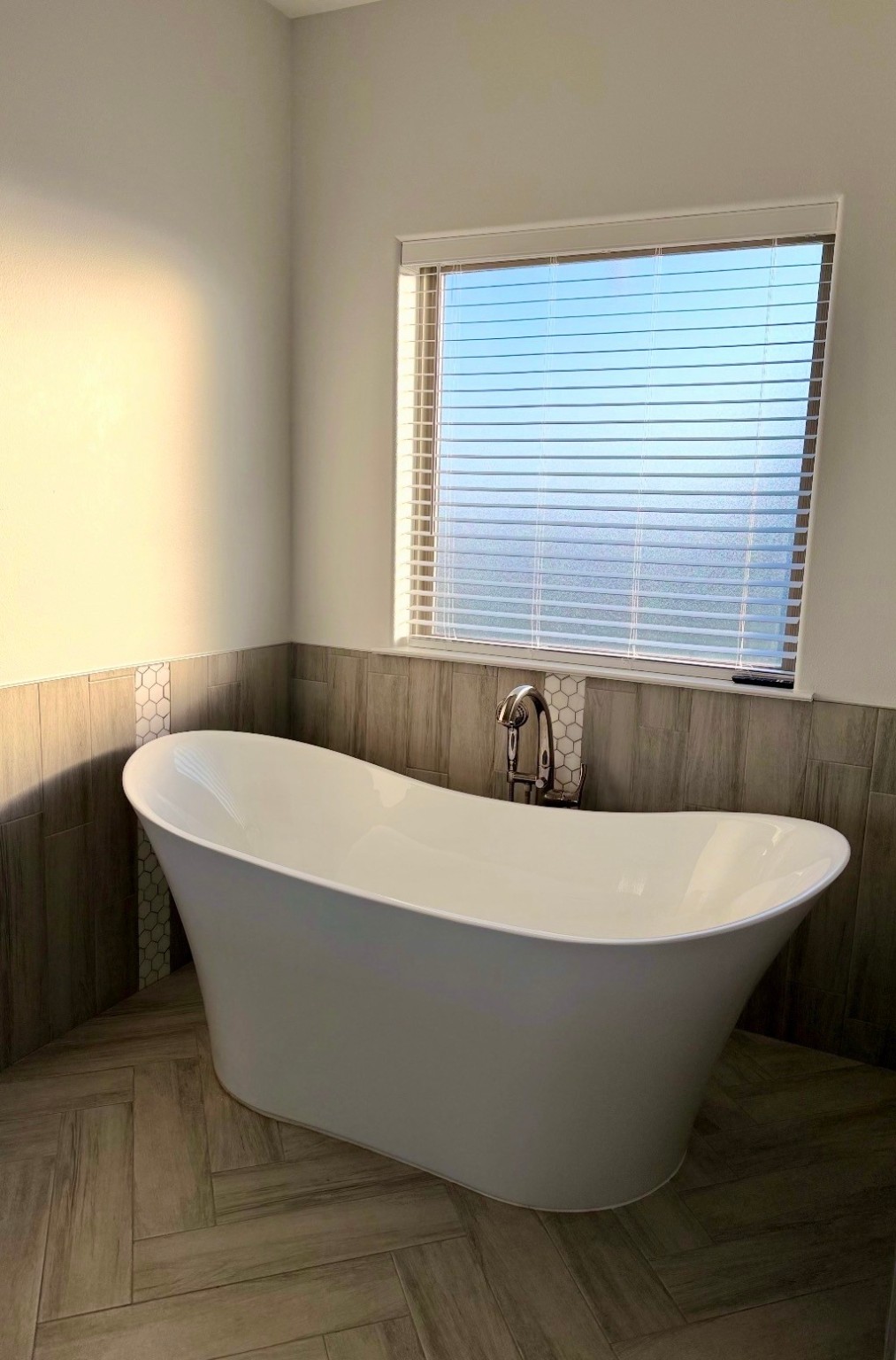 2295 Diamond D Lane Beaumont, TX 77713 - Photo 19 of 28 a white bath tub sitting in a bathroom