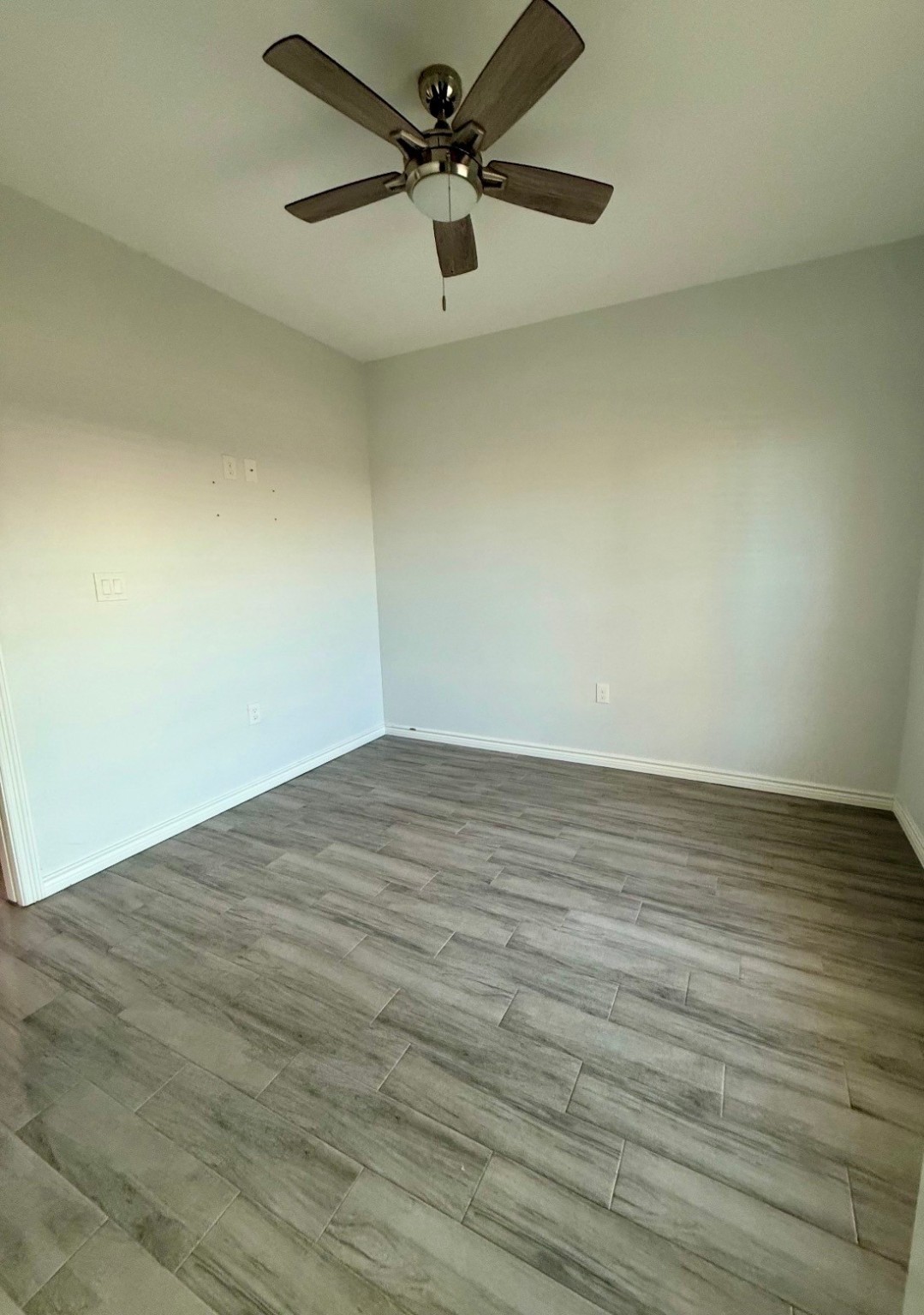 2295 Diamond D Lane Beaumont, TX 77713 - Photo 20 of 28 wooden floor in an empty room