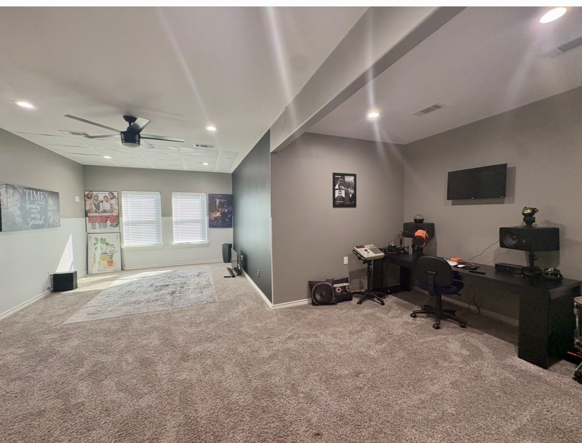 2295 Diamond D Lane Beaumont, TX 77713 - Photo 25 of 28 a view of a livingroom with workspace and a window