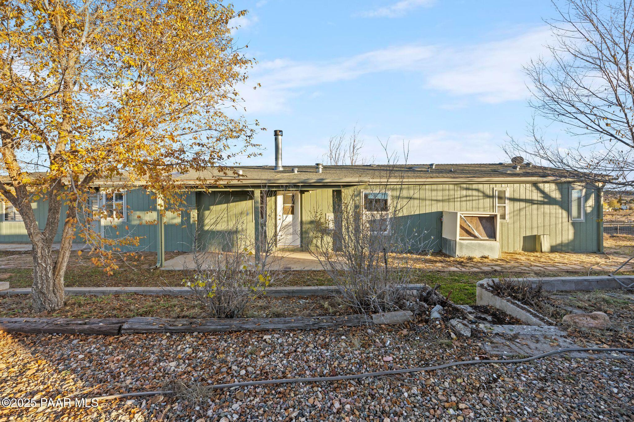 24580 North St Louis Street Paulden, AZ 86334 - Photo 23 of 26 a view of a house with a yard